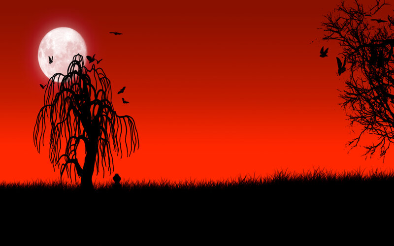 Red moon over spooky trees