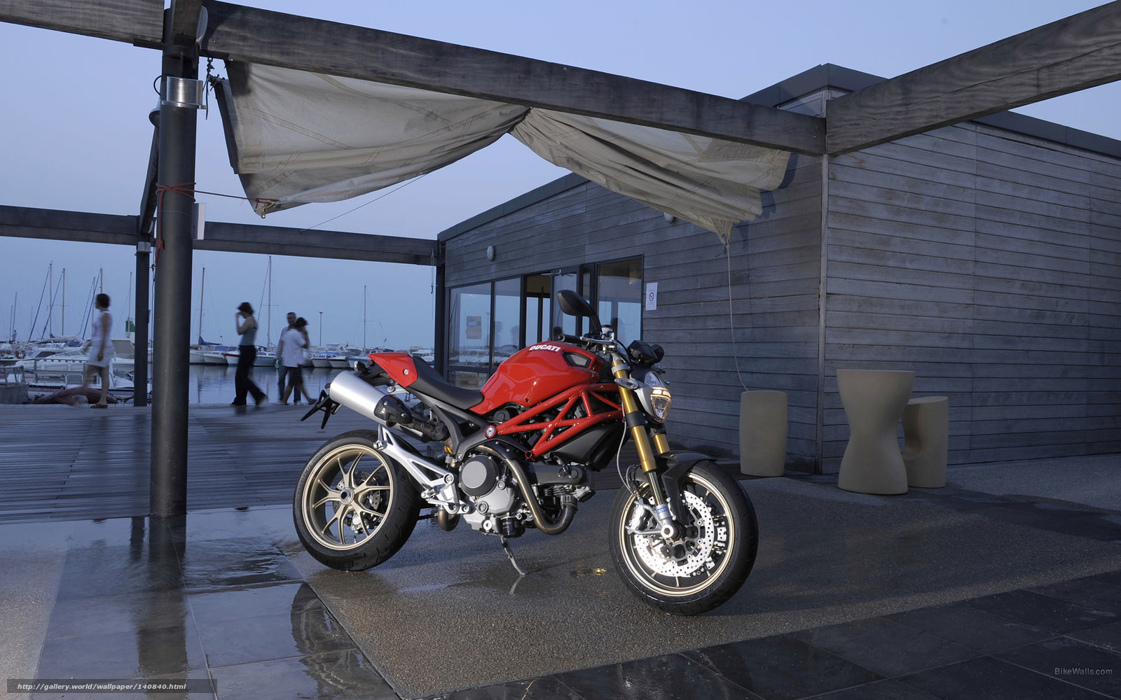 Red motorcycle at marina