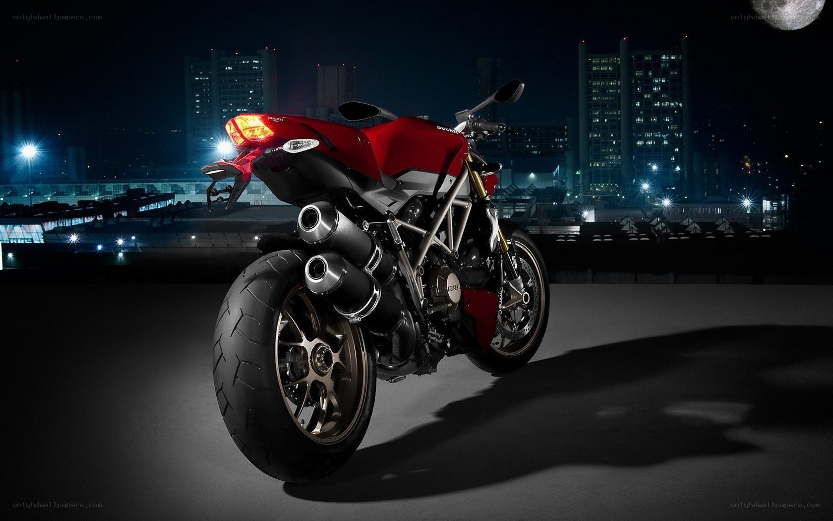 Red motorcycle at night