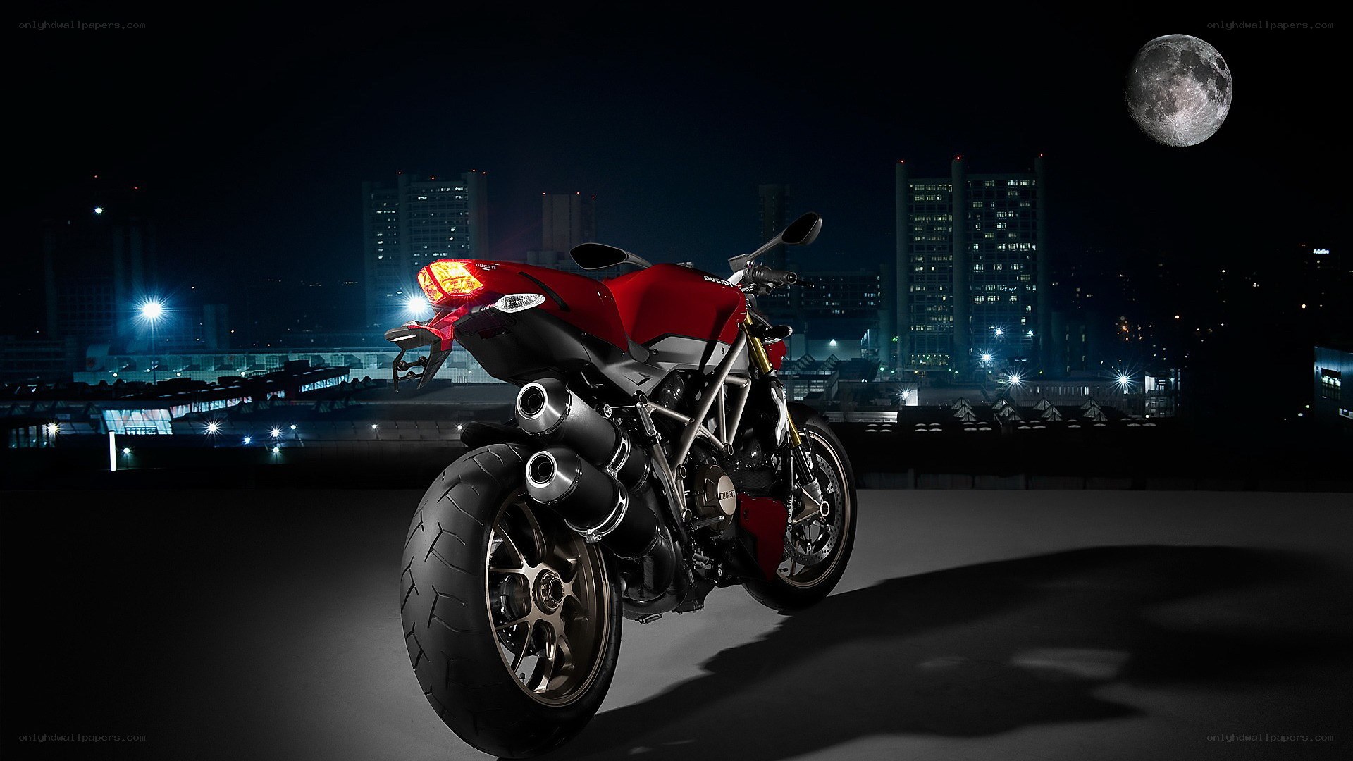 Red motorcycle at night
