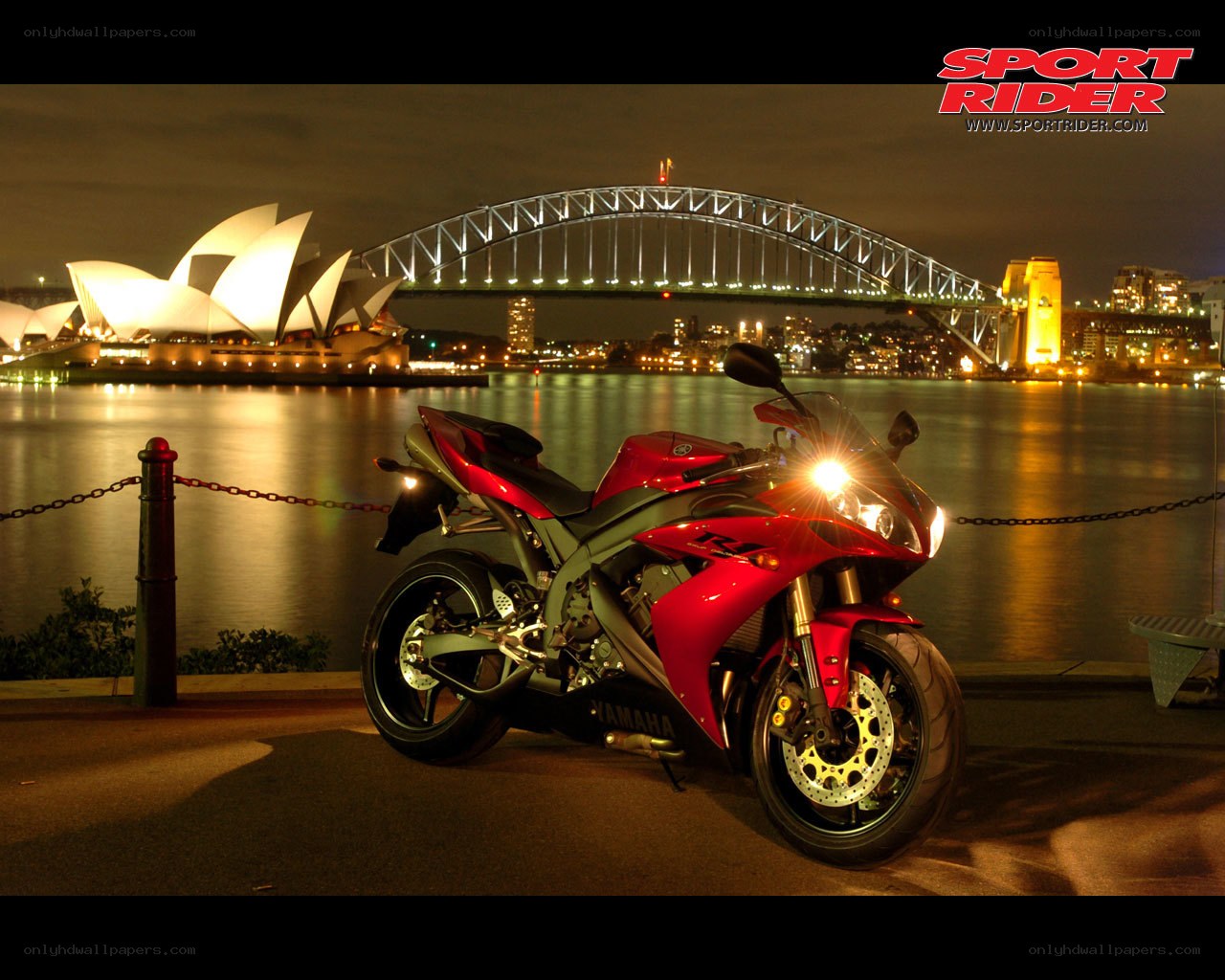 Red motorcycle at night in Sydney
