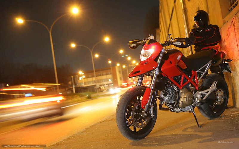 Red motorcycle at night