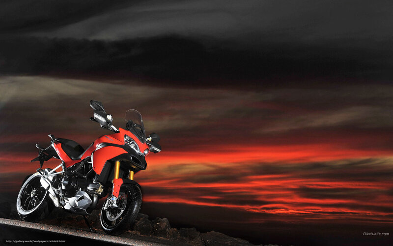Red motorcycle at sunset