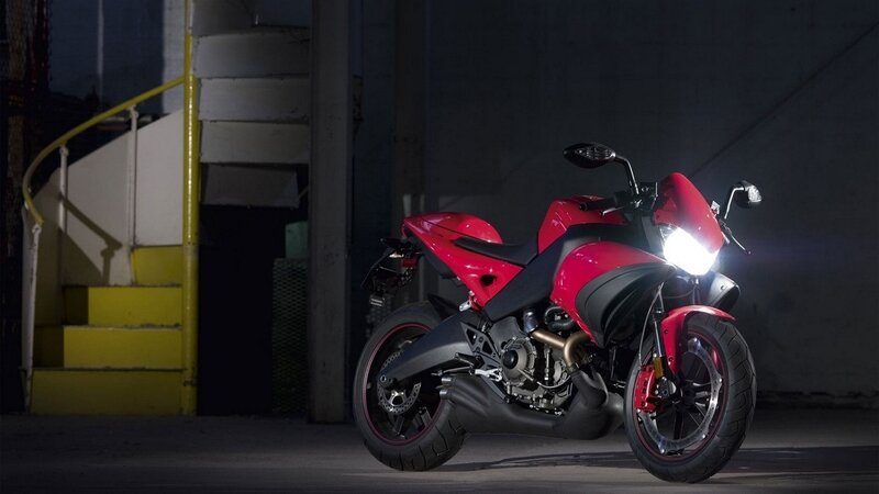 red motorcycle in dark garage