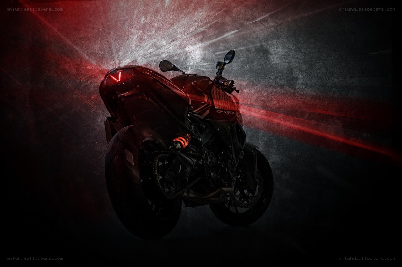Red motorcycle in dramatic lighting