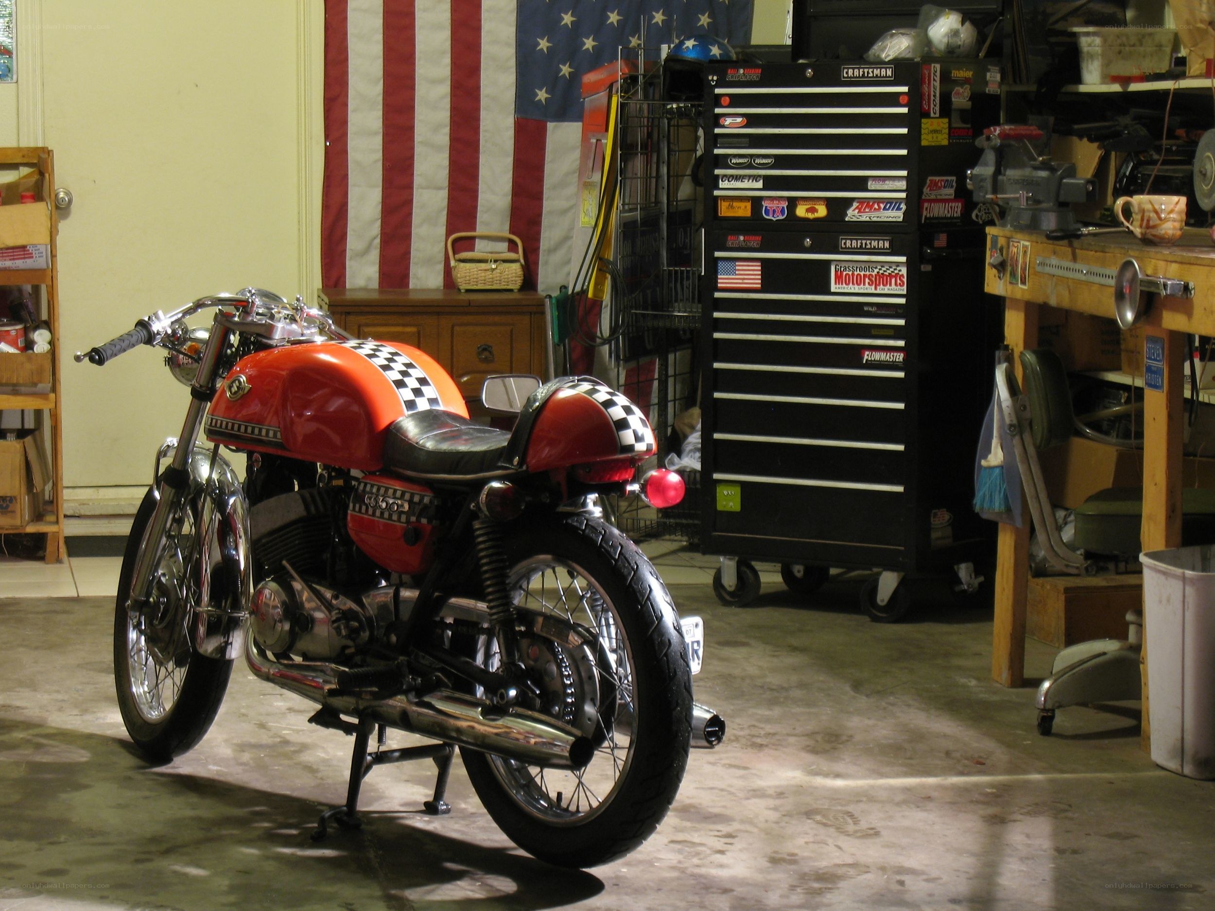 red motorcycle in garage
