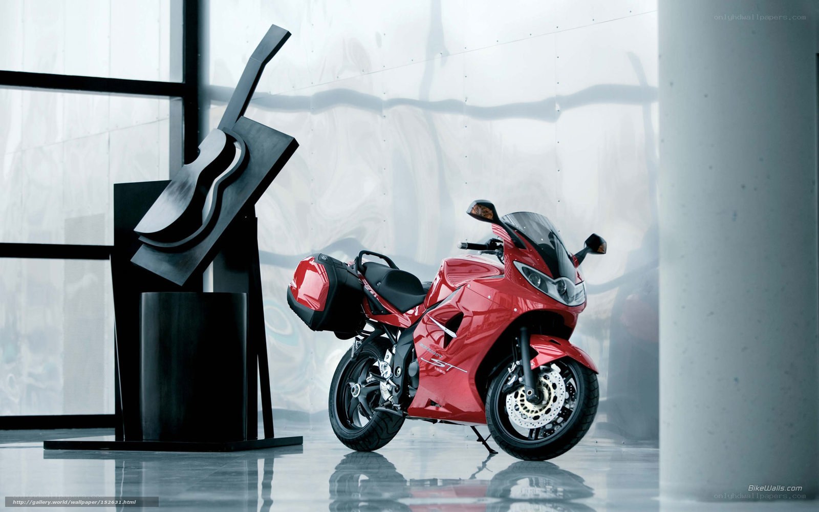 Red motorcycle in modern gallery