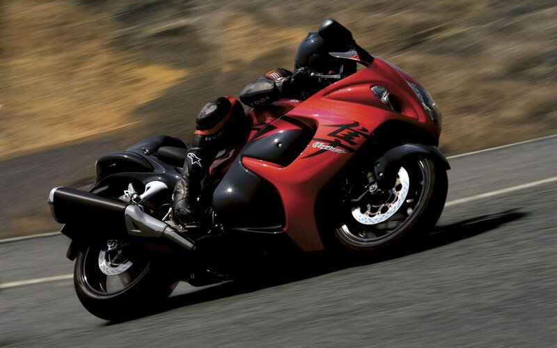 Red motorcycle in motion
