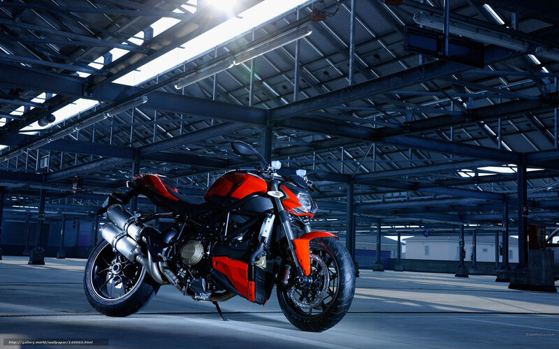Red motorcycle in warehouse