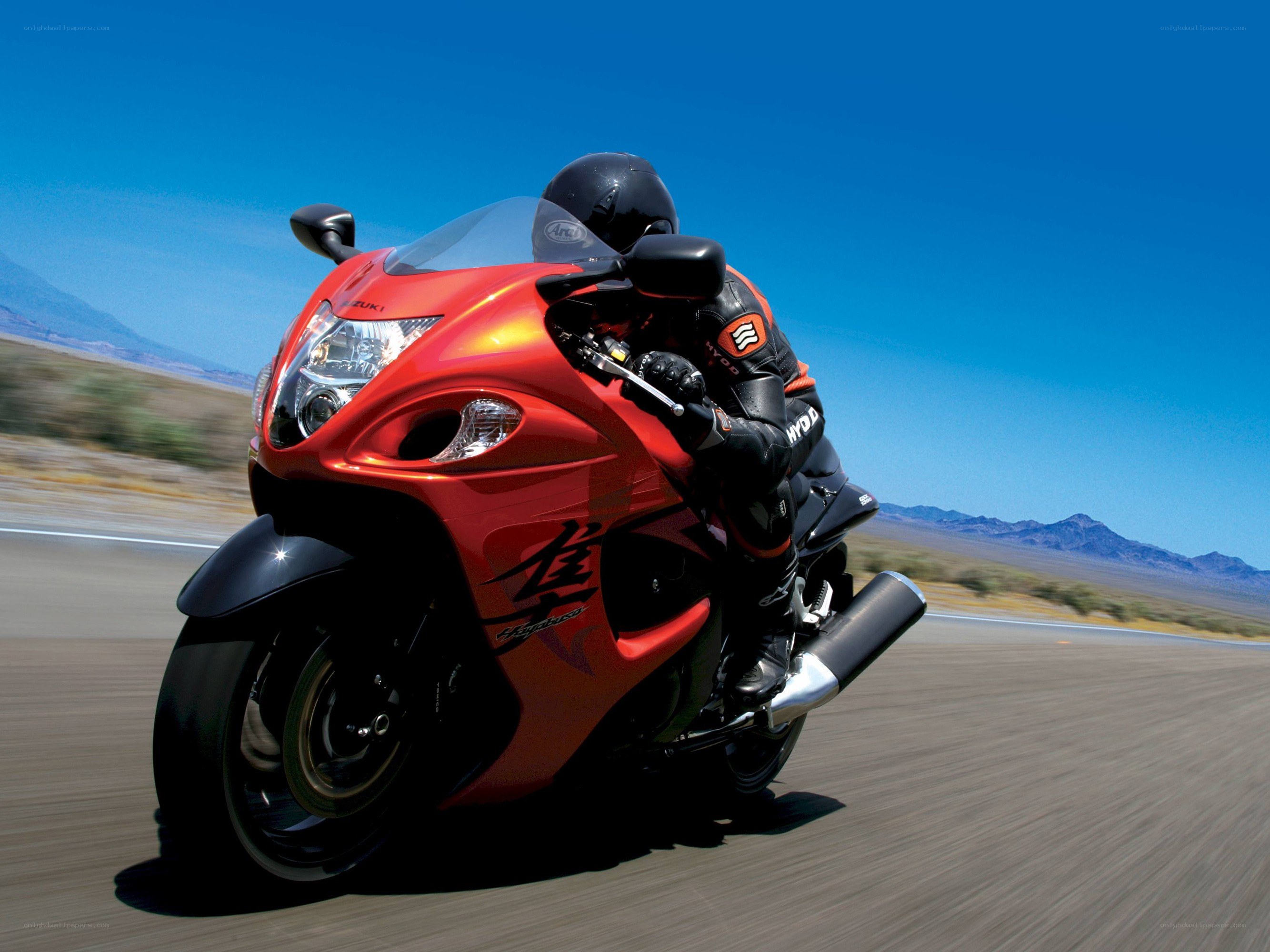 Red motorcycle on a desert road