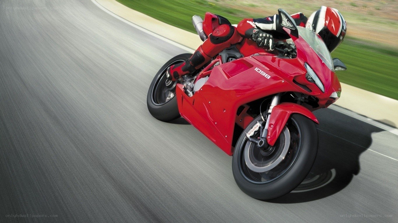 red motorcycle on a racetrack