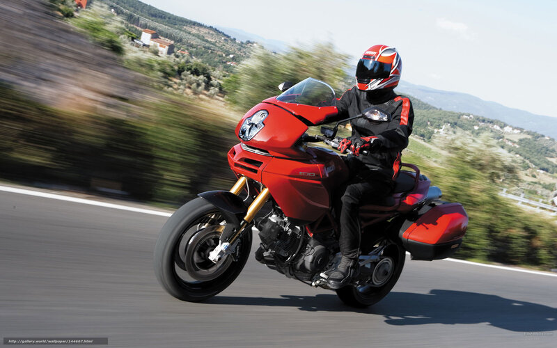 Red motorcycle on a winding road