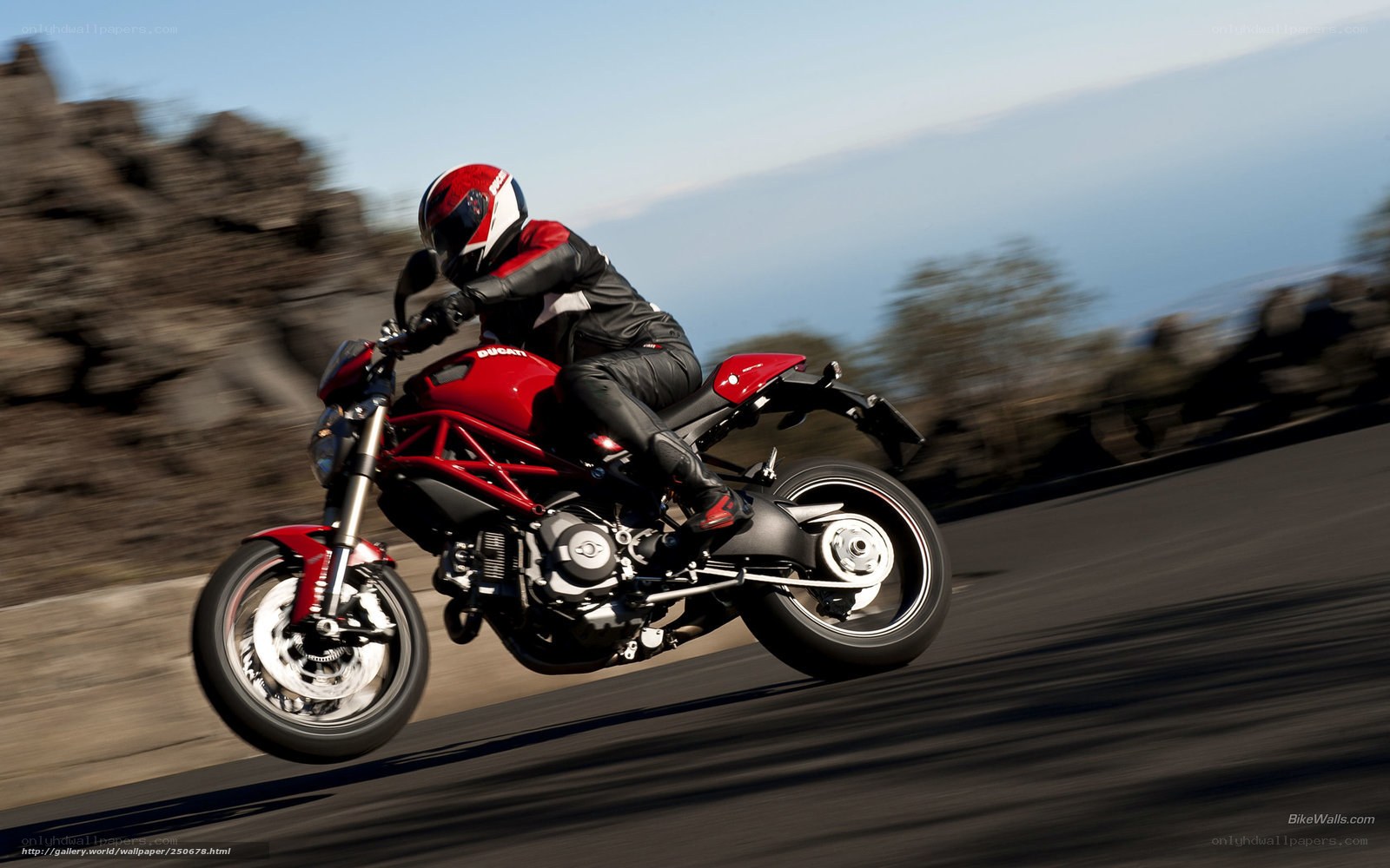 Red motorcycle on a winding road