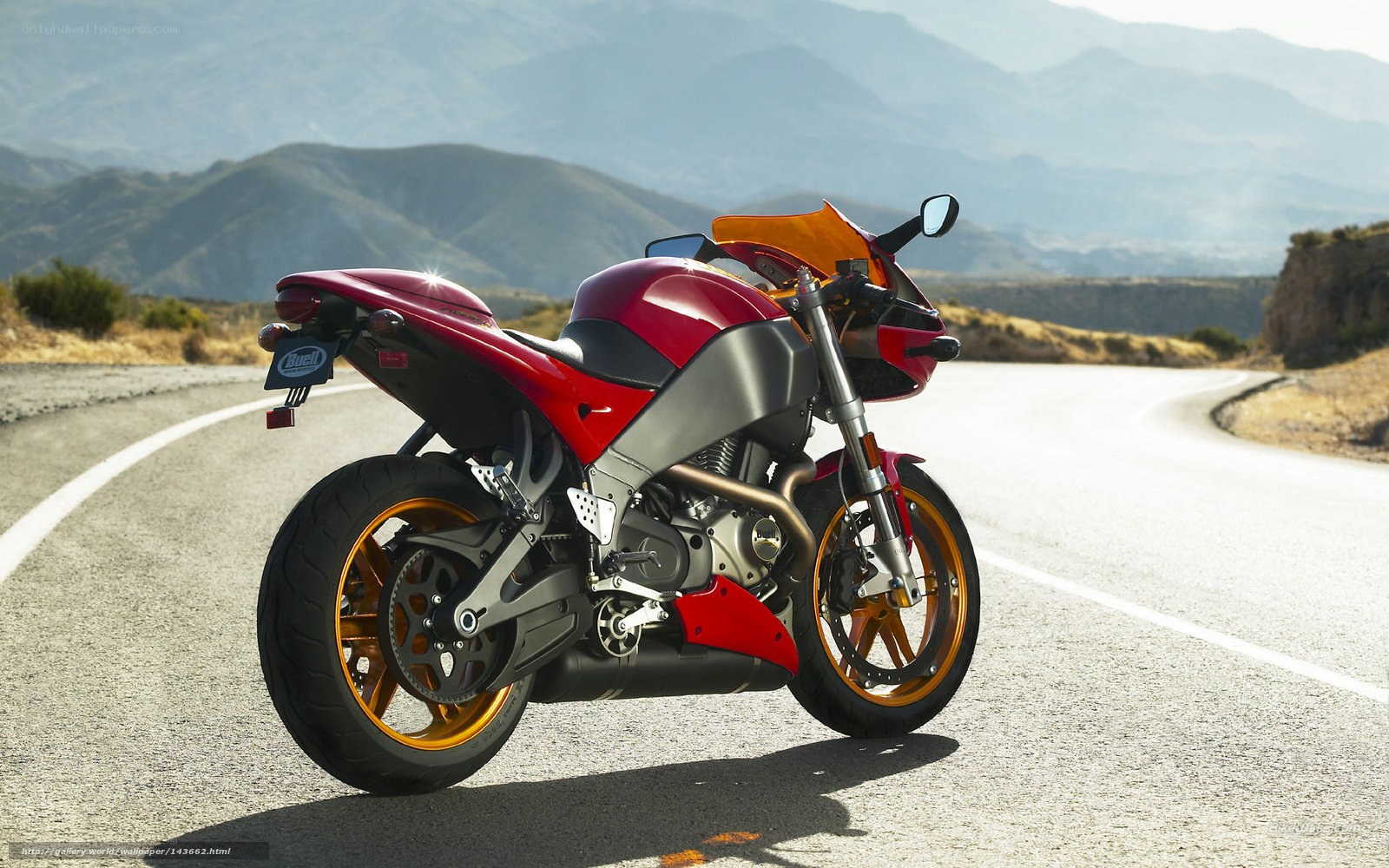Red motorcycle on a winding road