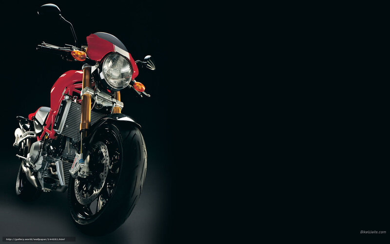 Red motorcycle on black background