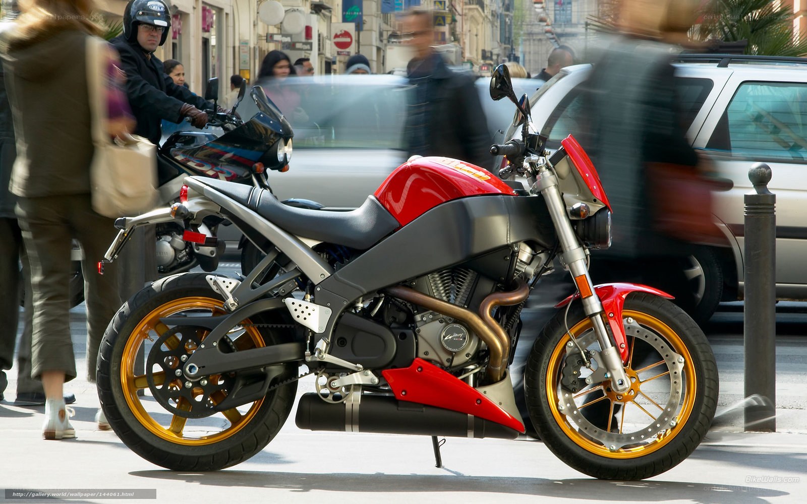 Red motorcycle on city street
