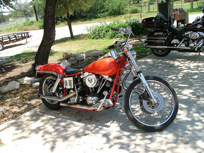 Red motorcycle on concrete