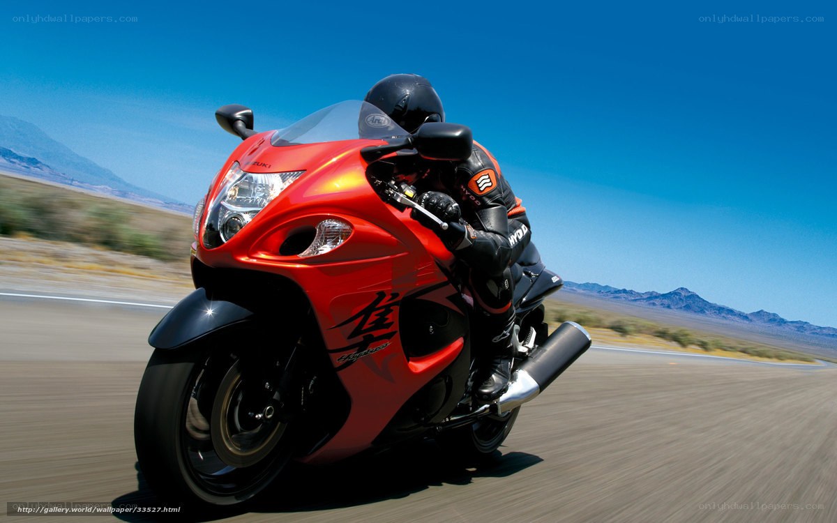 Red motorcycle on desert road