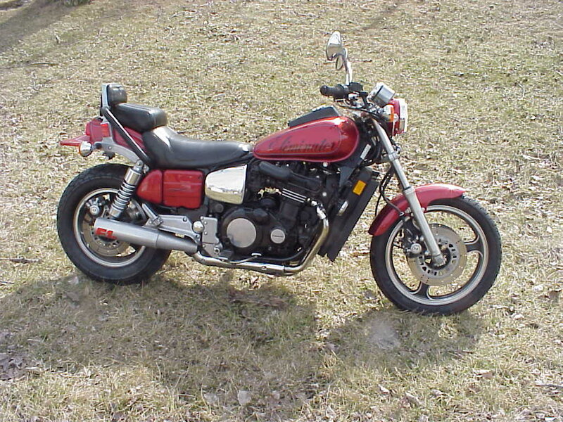 Red Motorcycle on Grass — Calm