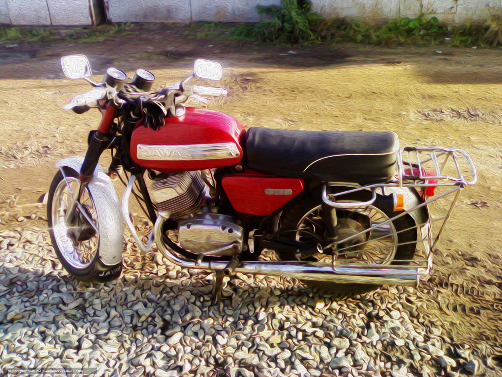Red motorcycle on gravel