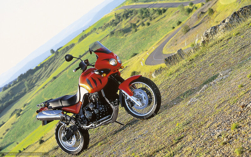Red Motorcycle on Hillside