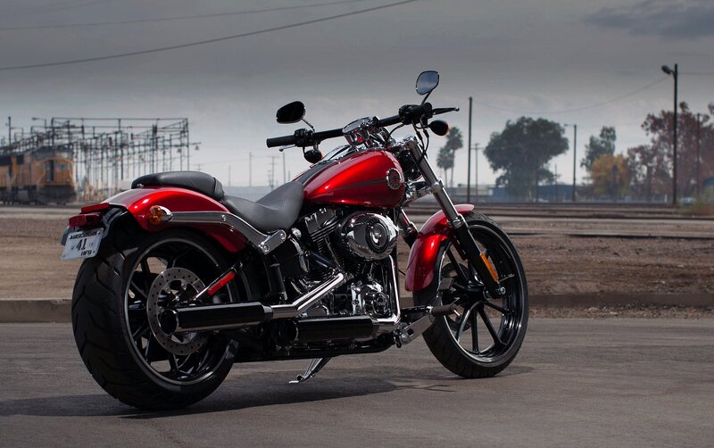 Red Motorcycle on Pavement — Dramatic, Afternoon