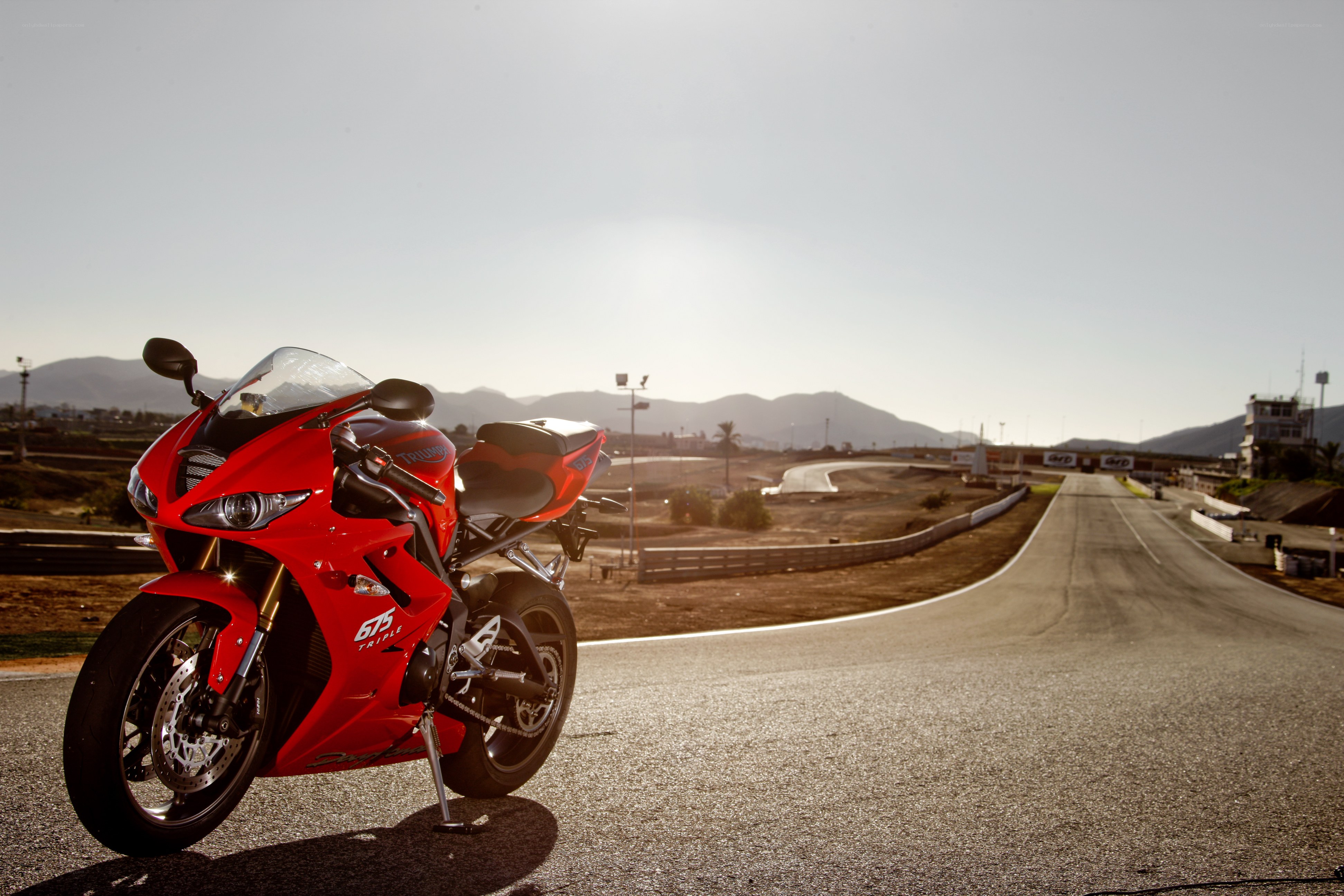 Red motorcycle on racetrack