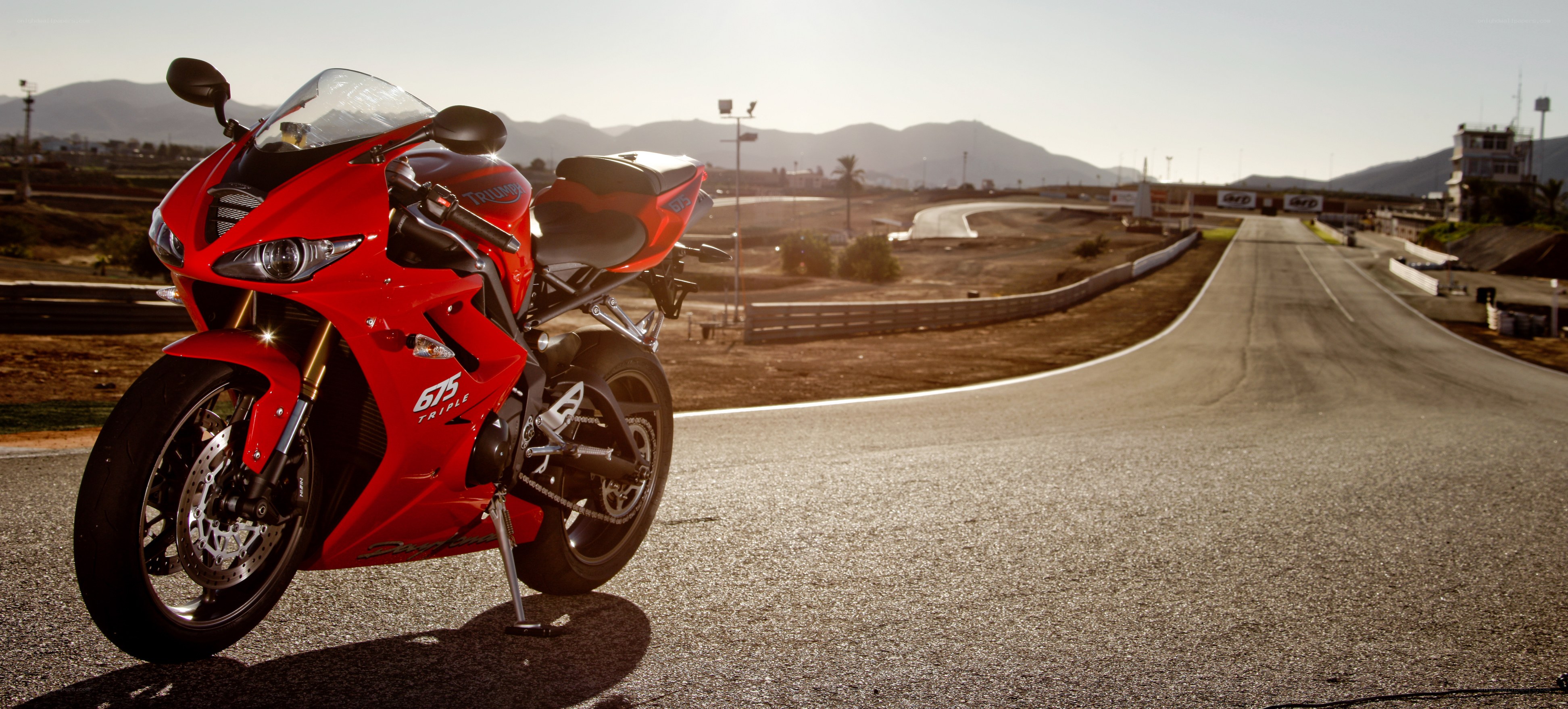 Red motorcycle on racetrack