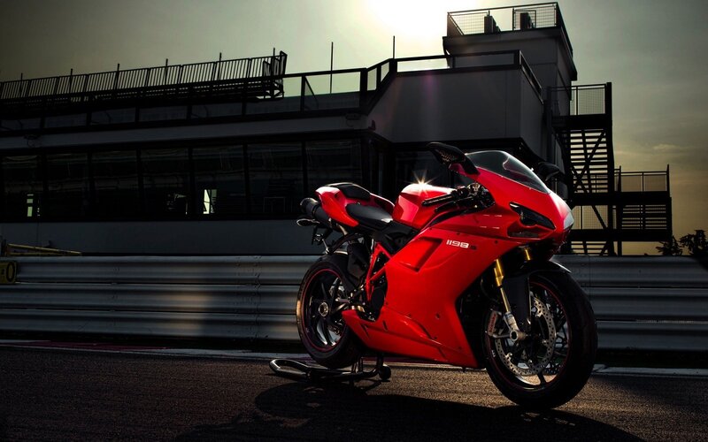Red motorcycle on racetrack
