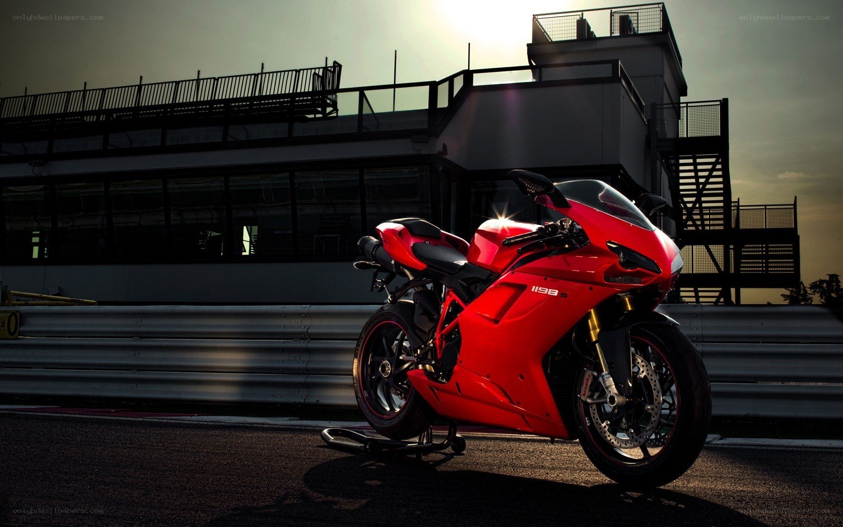 Red motorcycle on racetrack