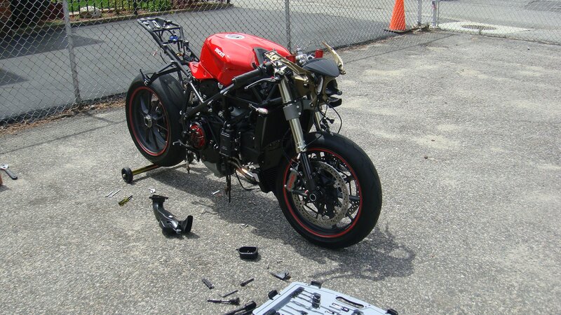Red Motorcycle on Stand — Neutral