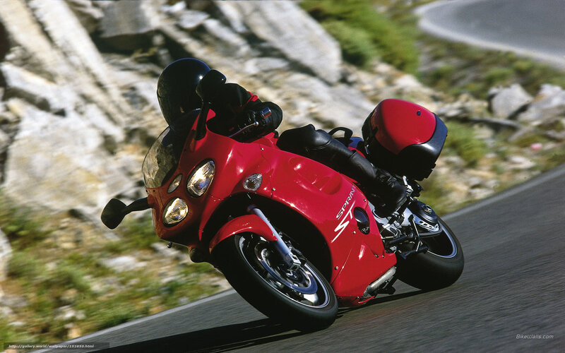 Red motorcycle on winding road