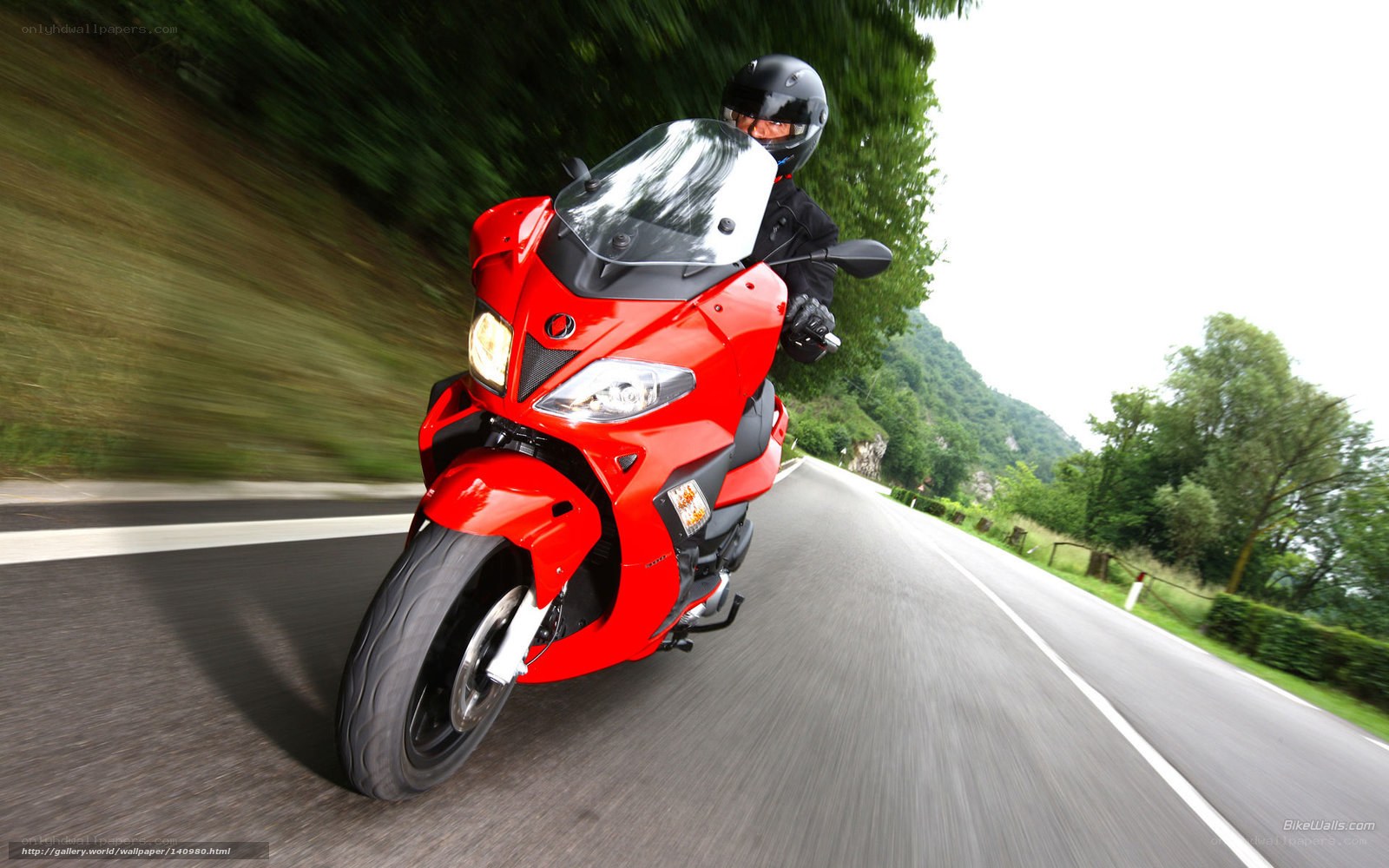 Red motorcycle on winding road