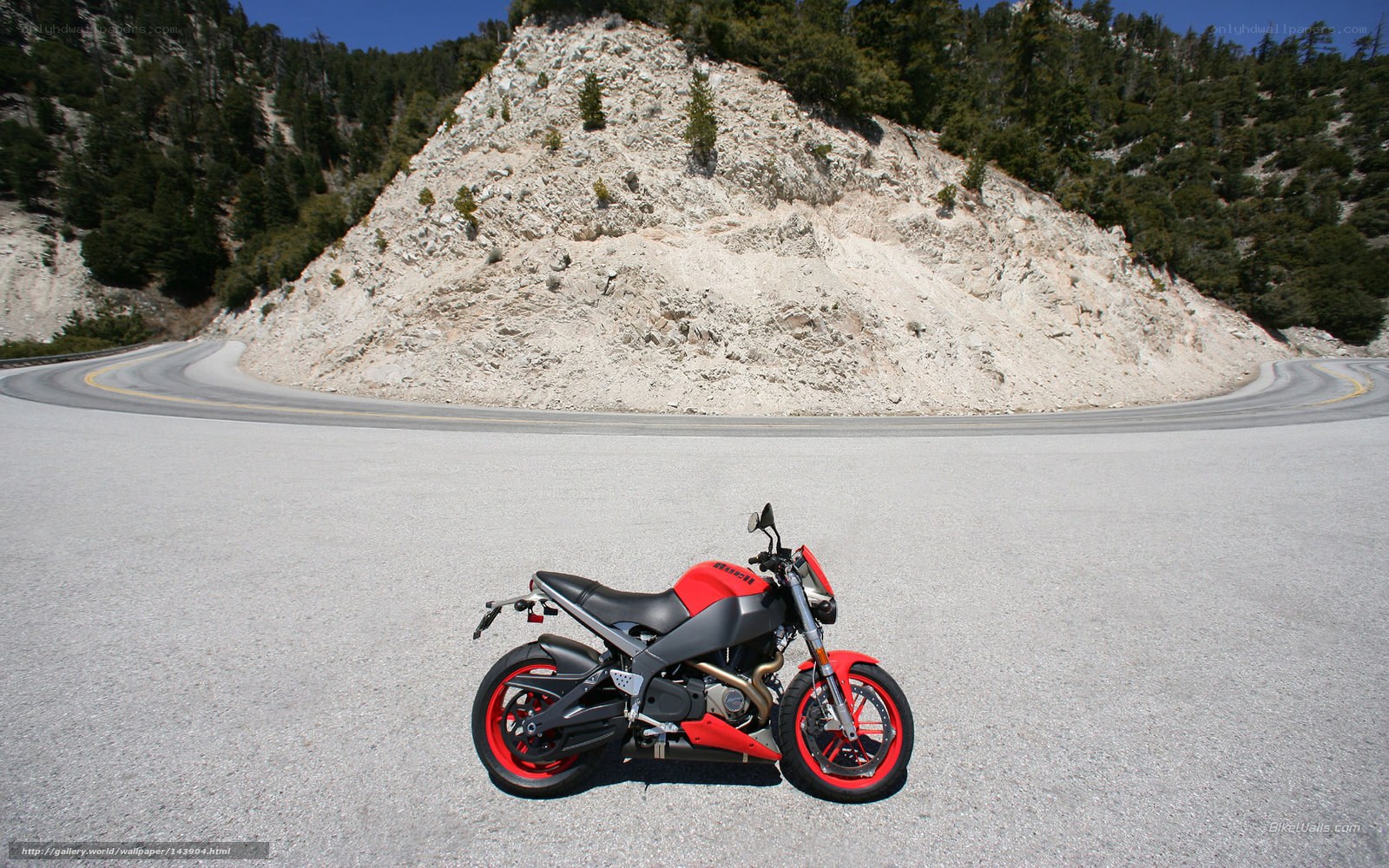 Red motorcycle on winding road