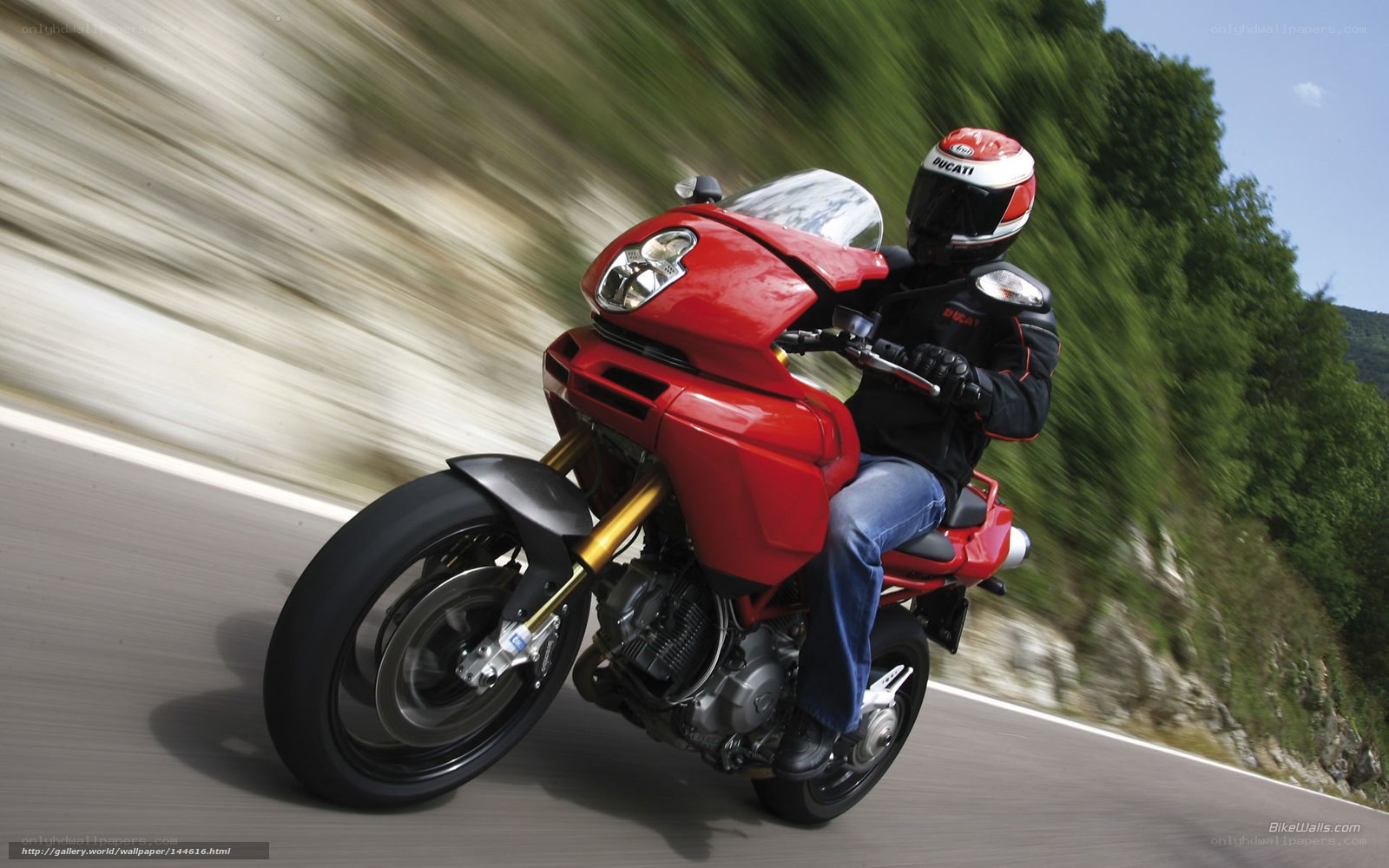 Red motorcycle on winding road