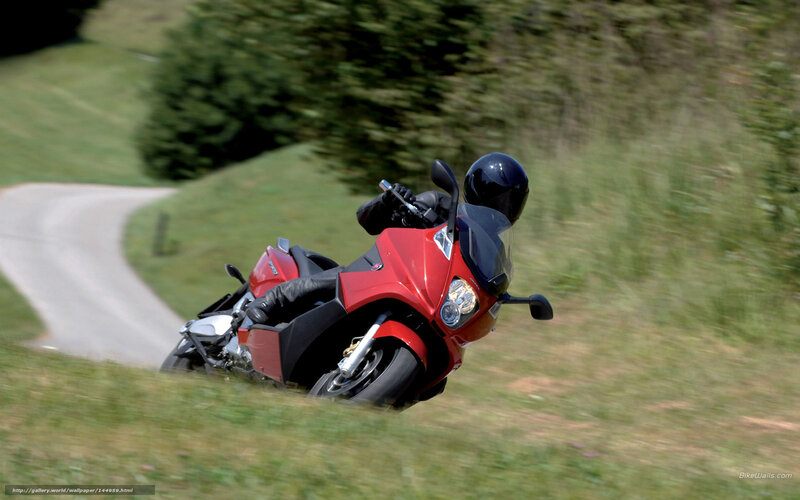 Red motorcycle on winding road