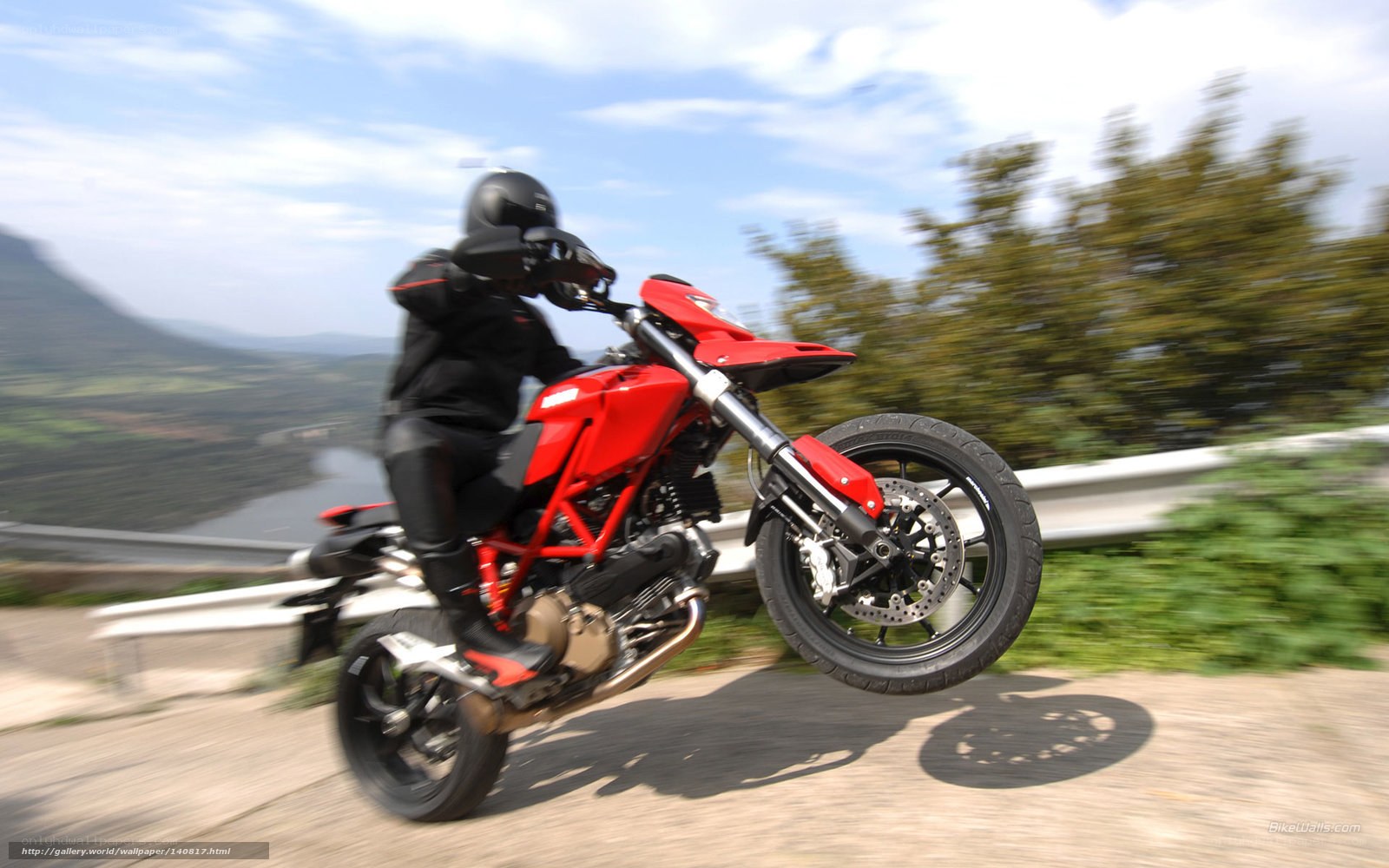 Red motorcycle on winding road
