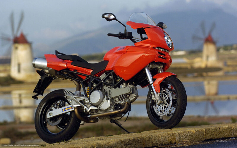 Red motorcycle with windmills