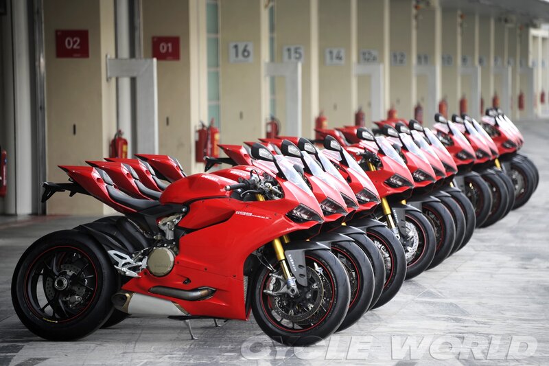 Red Motorcycles in Row — Orderly
