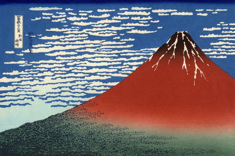 Red Mount Fuji under blue sky