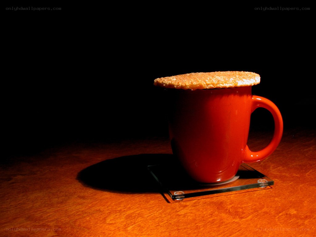 Red mug with cookie on top