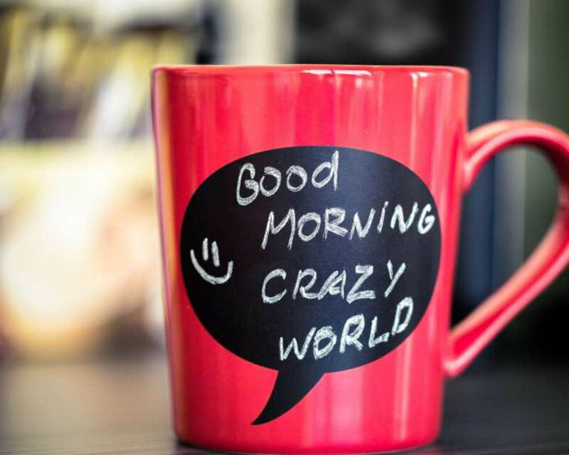 Red Mug with Text — Calm, Morning, Photograph
