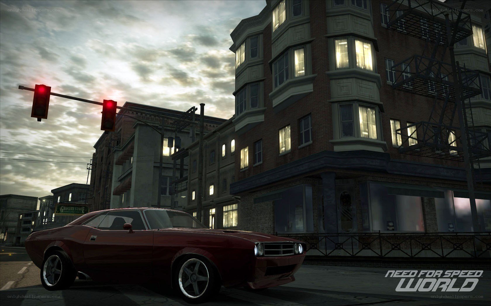 Red muscle car at a red light