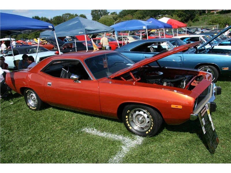 Red muscle car at a show