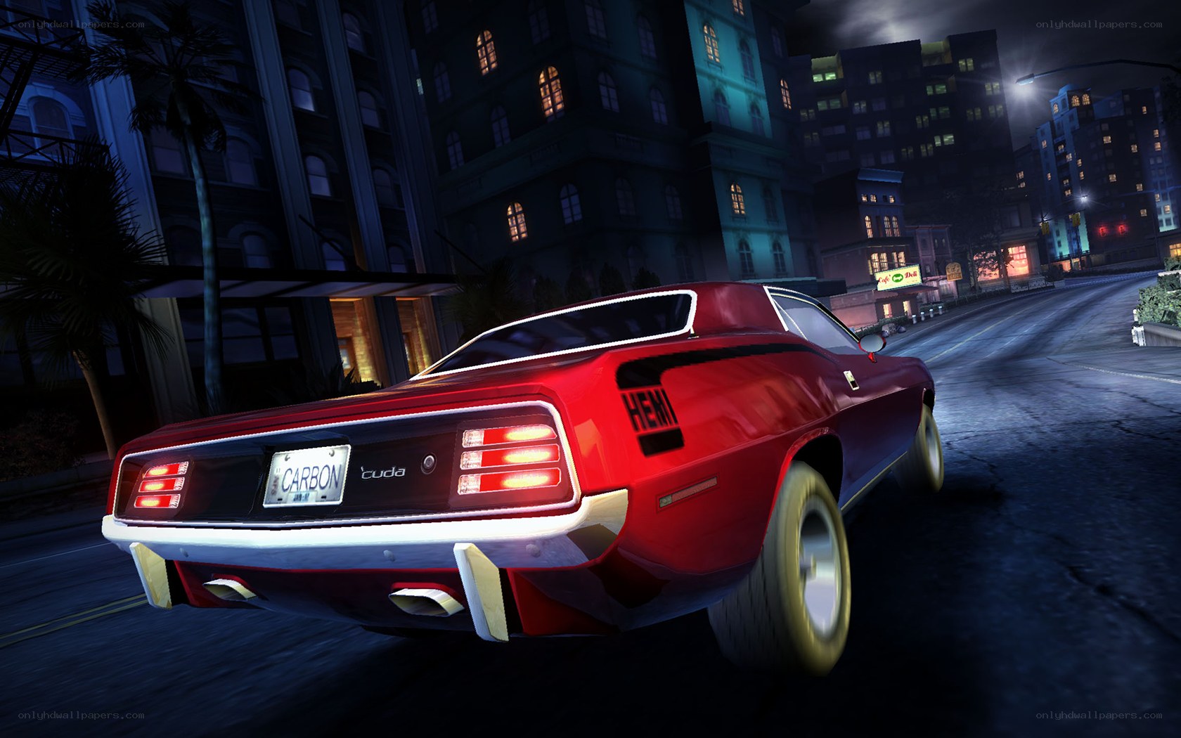 red muscle car at night