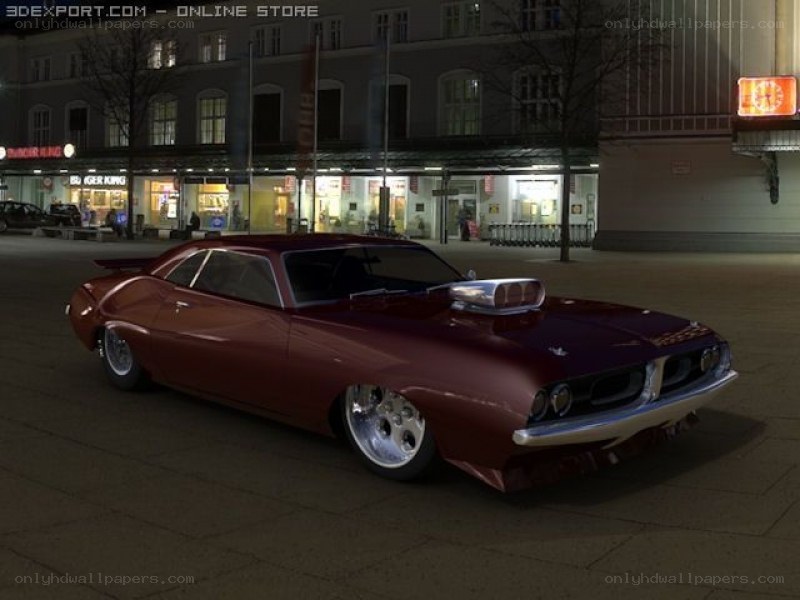 Red muscle car at night