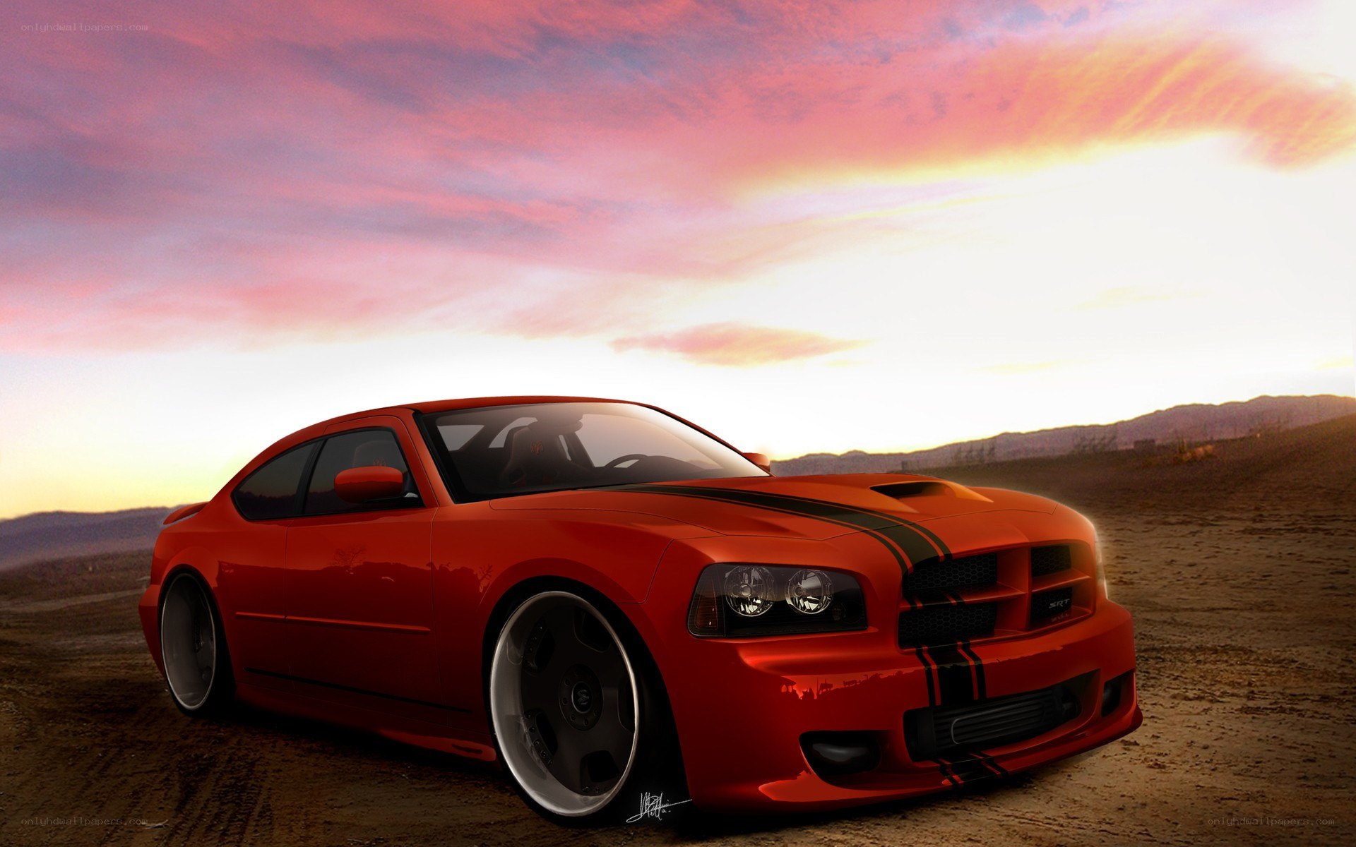 Red muscle car at sunset