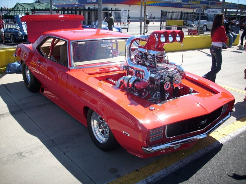 Red Muscle Car — Bright, Afternoon, Photograph, Woman