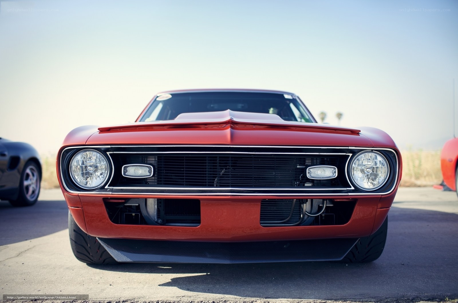 Red muscle car front view