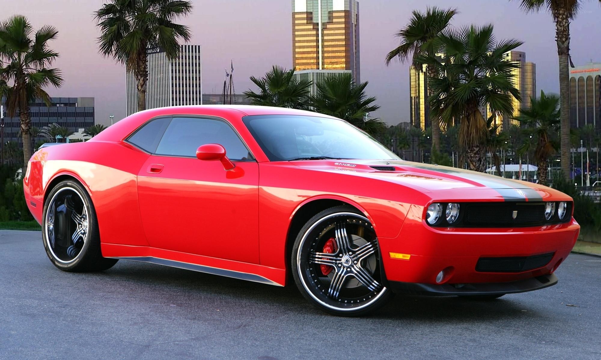 Red muscle car in city
